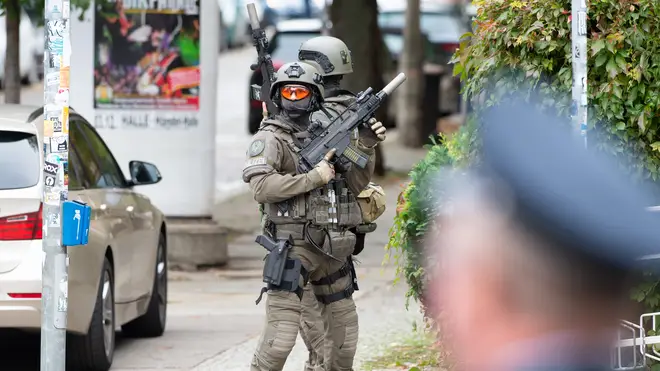 Armed officers in the immediate aftermath of the shooting