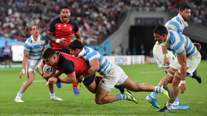 England's Ben Youngs scores his sides third try during the match against Argentina