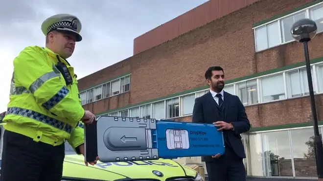 Justice Secretary Humza Yousaf and Ch Supt Stewart Carle welcome the new roadside drug testing kits