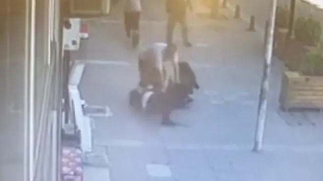 The domestic abuser was tackled to the floor with  a flying headbutt