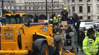 Video Shows Digger Removing Extinction Rebellion Protesters From Structure