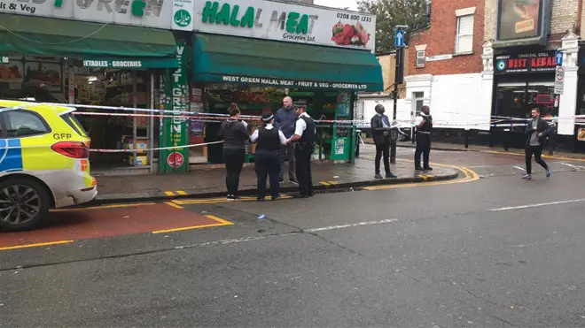 Police at the scene of the double stabbing in Tottenham