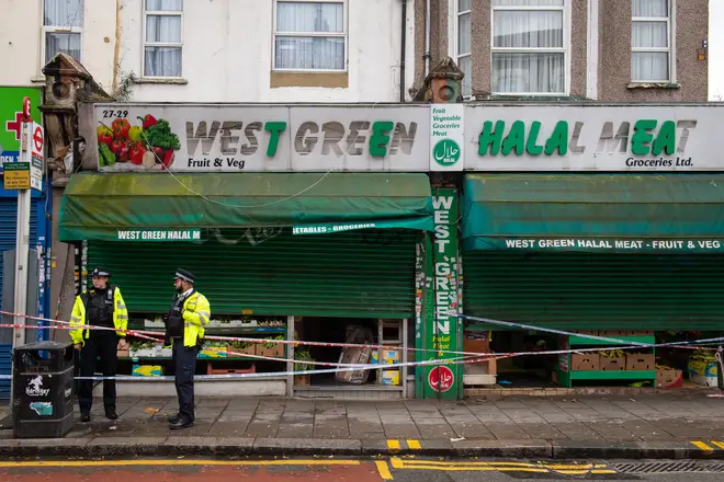 Police outside the West Green Halal Meat butcher's shop on West Green Road, Tottenham, London, following an incident where two men were stabbed and a third man was assaulted.