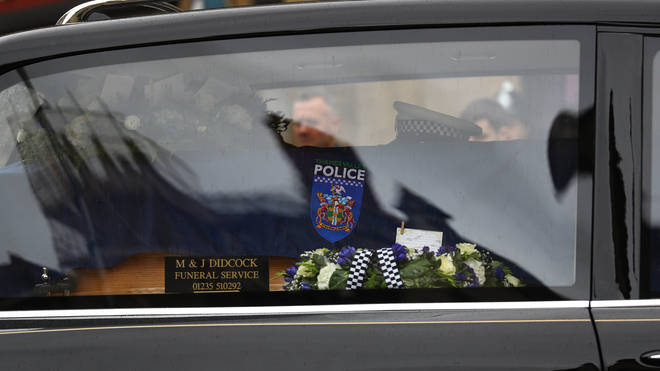 His coffin was draped with the police crest