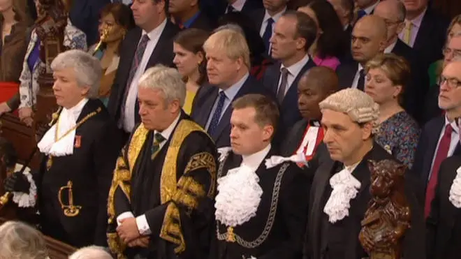 Boris Johnson, MPs and Commons officials listen to the Queen's Speech