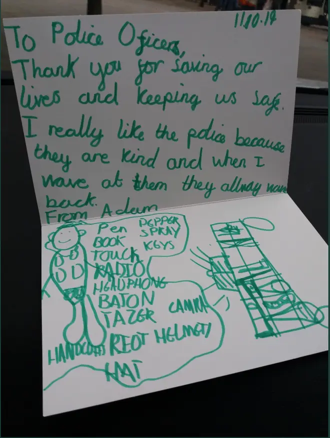 The handwritten note was left on the windscreen of a police van