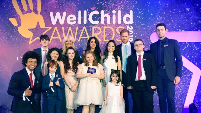 The Royal couple pose with the WellChild Award winners