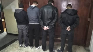 Photo released by the Bulgarian Interior Ministry shows four people allegedly arrested on charges relating to disturbances at the Bulgaria England football match