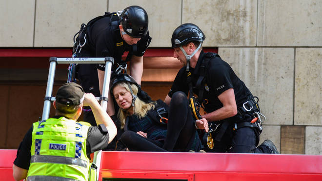 Two XR protesters were removed from a train at Canary Wharf DLR station