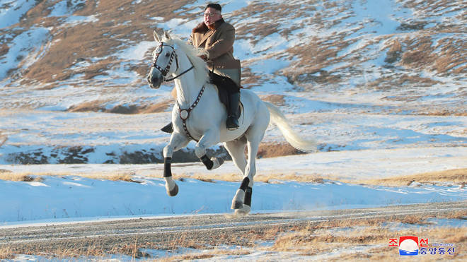Kim Jong Un pictured on horseback in the mountains of North Korea