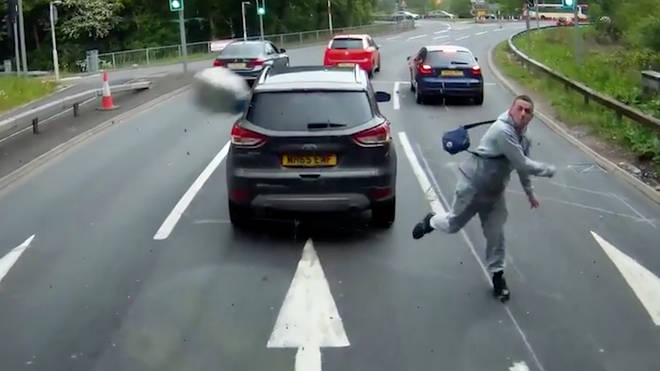 Man throws milk carton at driver's windscreen