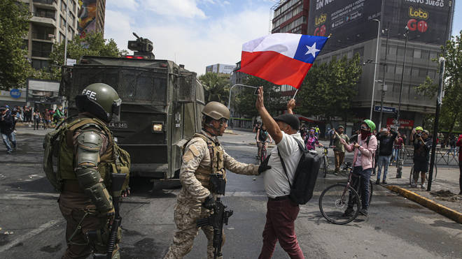 Soldiers are patrolling Chile's streets for the first time since Pinochet's dictatorship