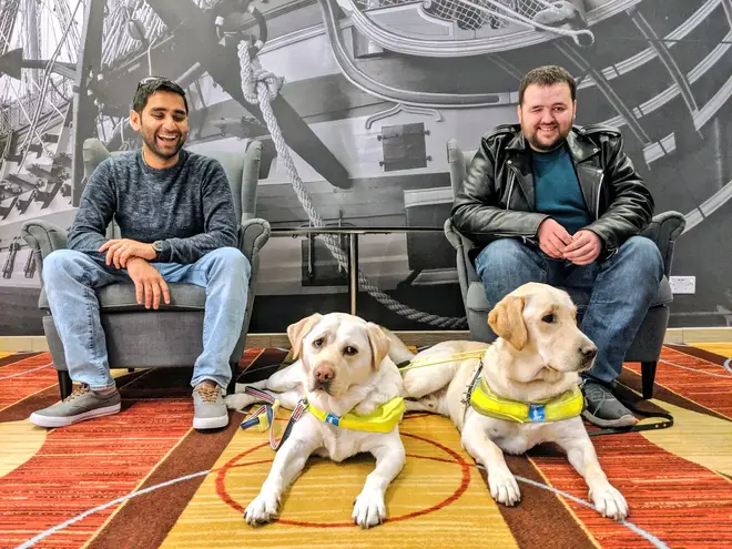 Dr Amit Patel and friend Jonathan Attenborough with their guide dogs