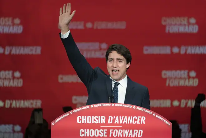 Justin Trudeau celebrates a narrow victory