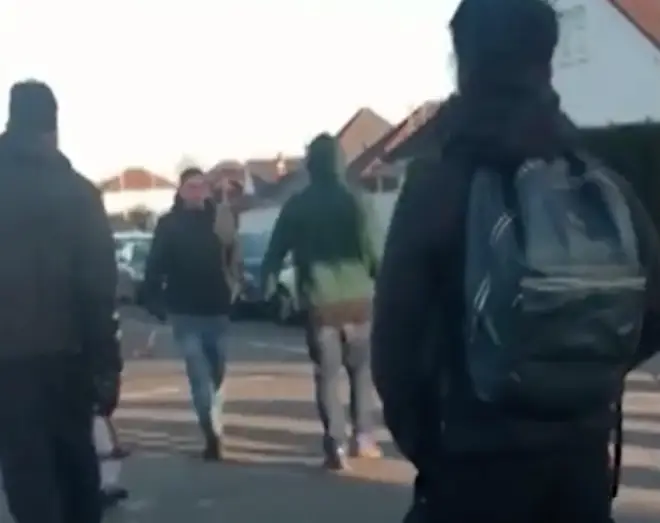 Rival gangs clash outside school