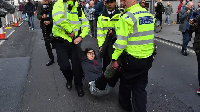 Another protester is arrested by police