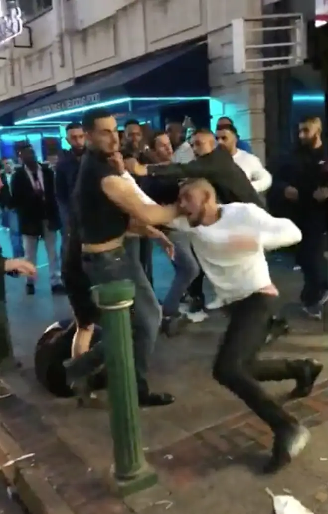 The fight was filmed outside a Birmingham takeaway in the early hours of Sunday
