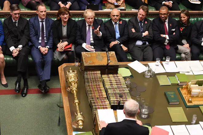The Prime Minister gesticulates at Jeremy Corbyn in the Commons