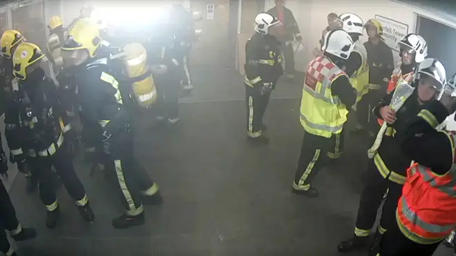 Dany Cotton wearing full fire kit (centre, right), inside Grenfell Tower at around 3.05am on then morning of the fire