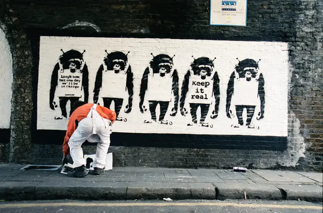 Photographs Show Banksy at work for the first time