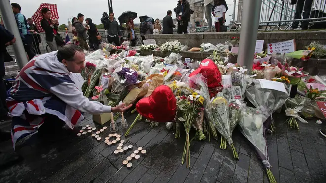Floral tributes were laid in Potters Fields Park