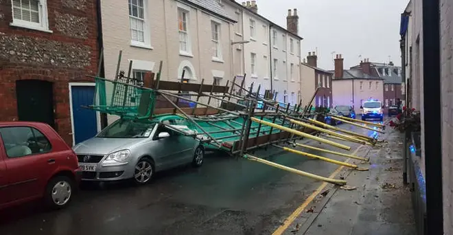 A car has been crushed in Dorset after scaffolding collapsed.