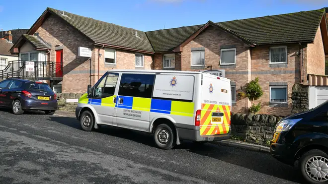 A police vehicle outside Ashville Ashville Residential Care Home in Brithdir, South Wales