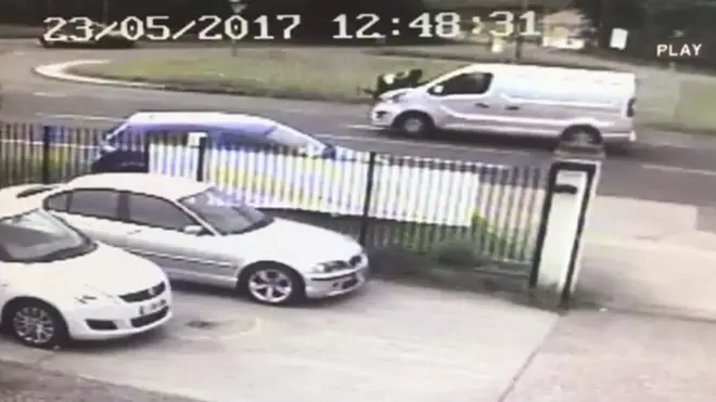 CCTV shows the delivery driver clinging on to the bonnet of his van.
