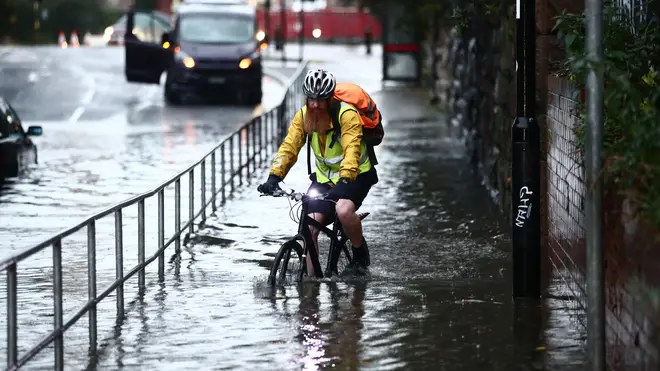 This cyclist struggled through flood water in Sheffield