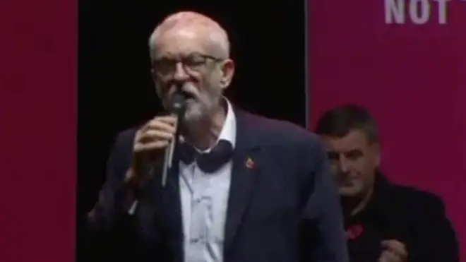 Ian Byrne standing on stage with Jeremy Corbyn last night