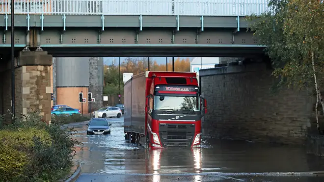 A lorry makes its way through floodwater in Sheffield