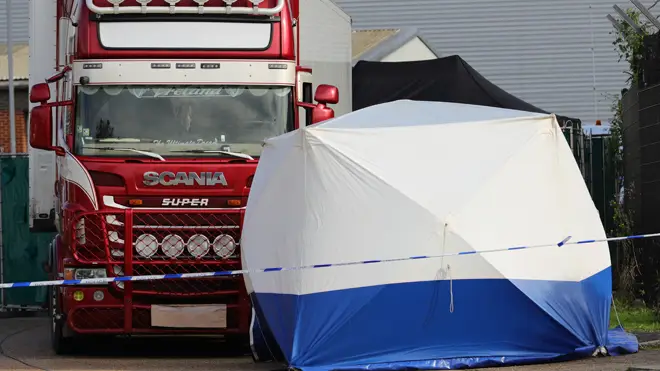 Police at the scene in Essex where 39 people were found dead in the back of a lorry