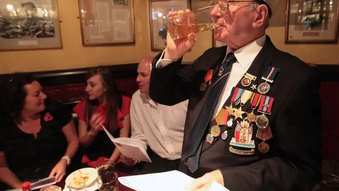 War veterans held their annual 'sing song' after Remembrance Sunday at the Sherlock Holmes pub off Whitehall in London
