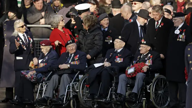 Military veterans arrive for the Remembrance Sunday ceremony at the Cenotaph
