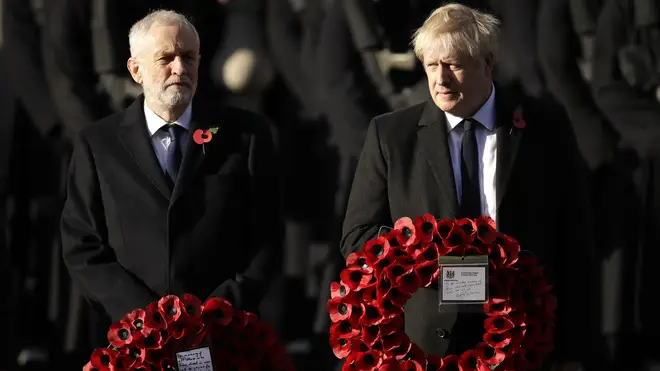 Boris Johnson and Jeremy Corbyn stand side-by-side at the remembrance service