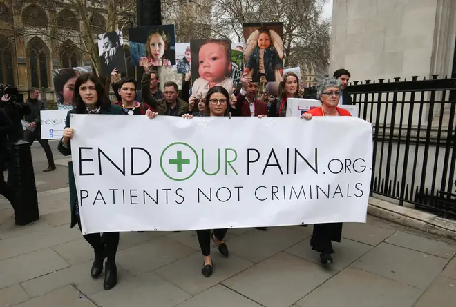 Medical cannabis campaigners in Westminster before handing in a petition in at 10 Downing Street, London