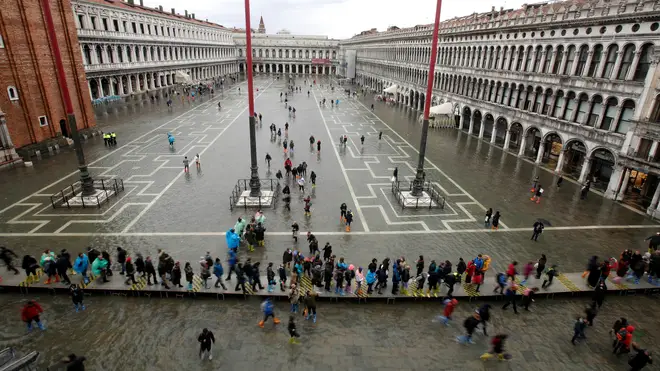 St Mark's Square was left totally submerged by flood waters