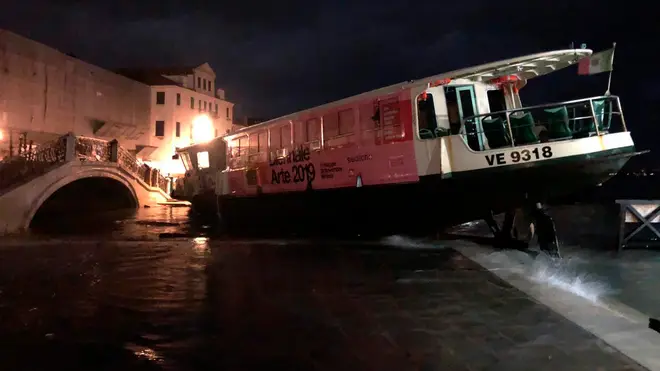 One of the city's famous waterbuses was upended by flood waters