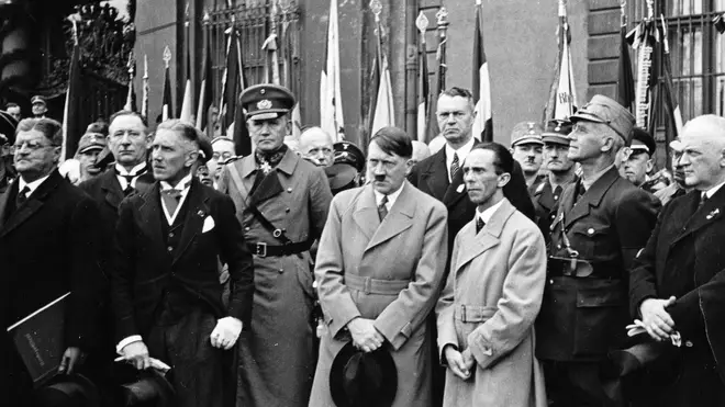 Adolf Hitler standing with Reich Propaganda Minister Joseph Goebbels in 1933.
