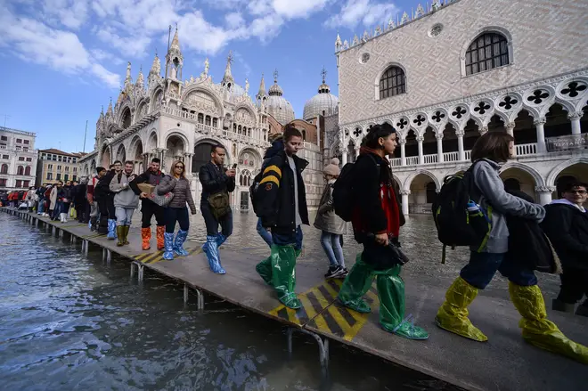 Much of Venice was left under water after the highest tide in 50 years ripped through the historic Italian city