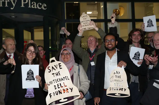 Campaigners ring hand bells in protest ahead of a meeting with Tower Hamlets Council's planning committee