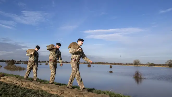 Army personnel deployed to assist with flood defence efforts