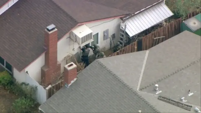 Officers searched a home in the wealthy suburb outside Los Angeles