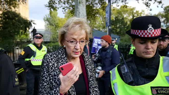 Add to lightbox Brexit Business Secretary Andrea Leadsom is escorted by police officers in Parliament Square, London, during an anti-Brexit, Let Us Be Heard rally