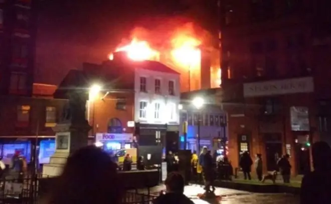 The fire is in a block of flats in Bolton