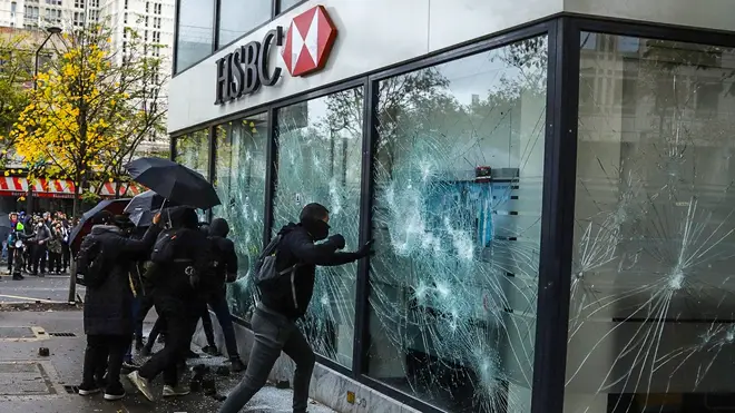 Protesters smashed a bank in the south of Paris