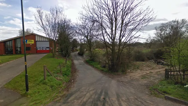 The body of a woman has been found next to a fire station in Worcester
