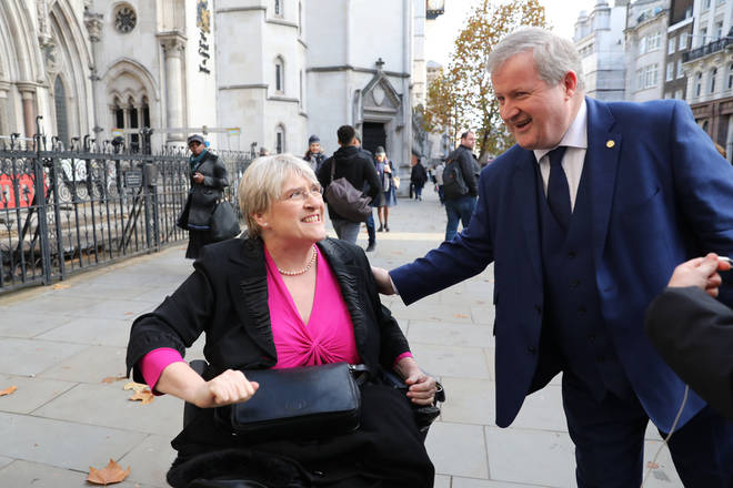 Democrat President Sal Brinton and SNP Westminster leader Ian Blackford arrive at the Royal Courts of Justice, London