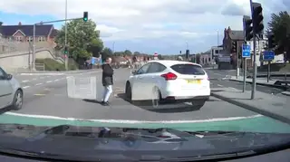 Two pedestrians narrowly avoided being hit at the crossing