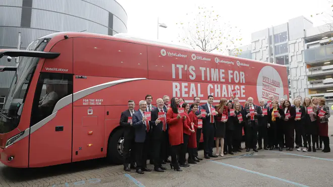 Labour candidates in front of their battle bus